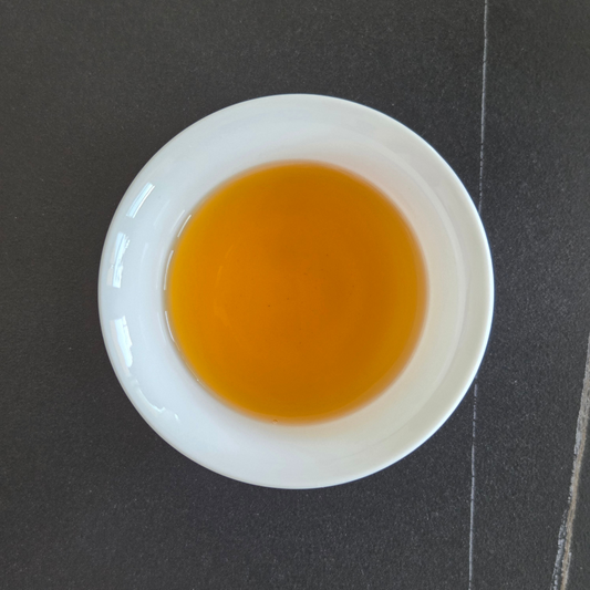 Brewed China Yunnan Sun-Dried black tea with amber liquor