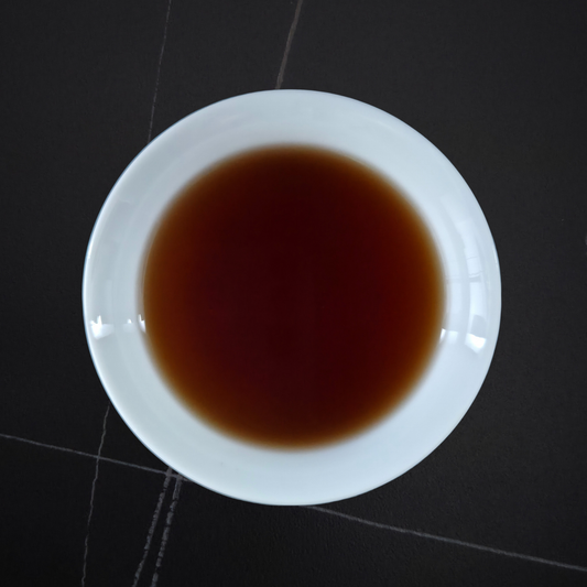 Brewed China Zi Cha 2012 shu pu’er with dark liquor