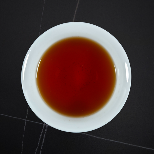 Brewed Taiwan Sun Moon Lake black tea with deep amber liquor