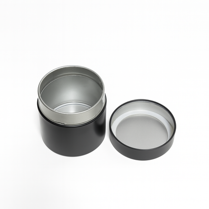 Open tea storage canister showing inner lid and airtight seal for preserving tea freshness