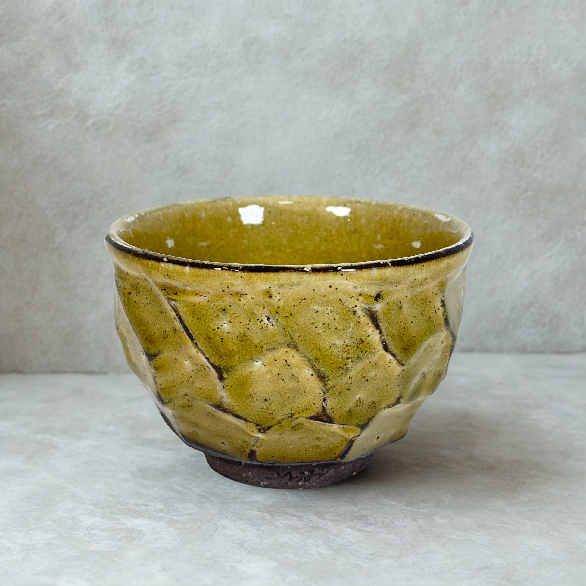 Handmade Japanese matcha bowl with olive green textured glaze ceramic chawan