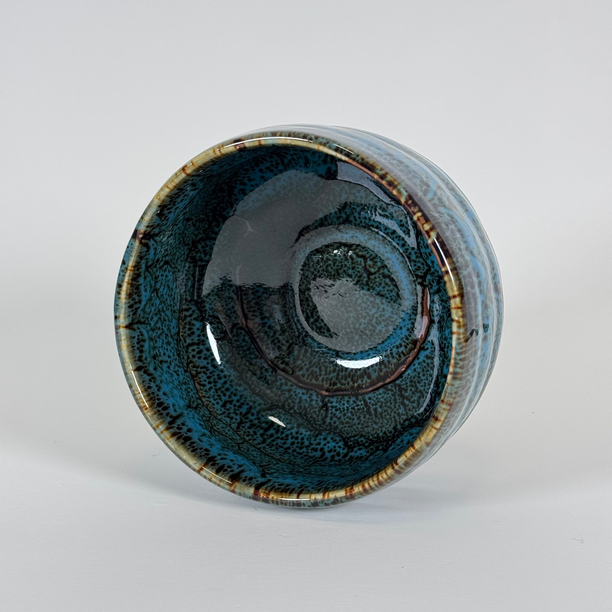 Top view of Celestial Tide Japanese matcha bowl showing deep blue glaze and textured interior for whisking matcha