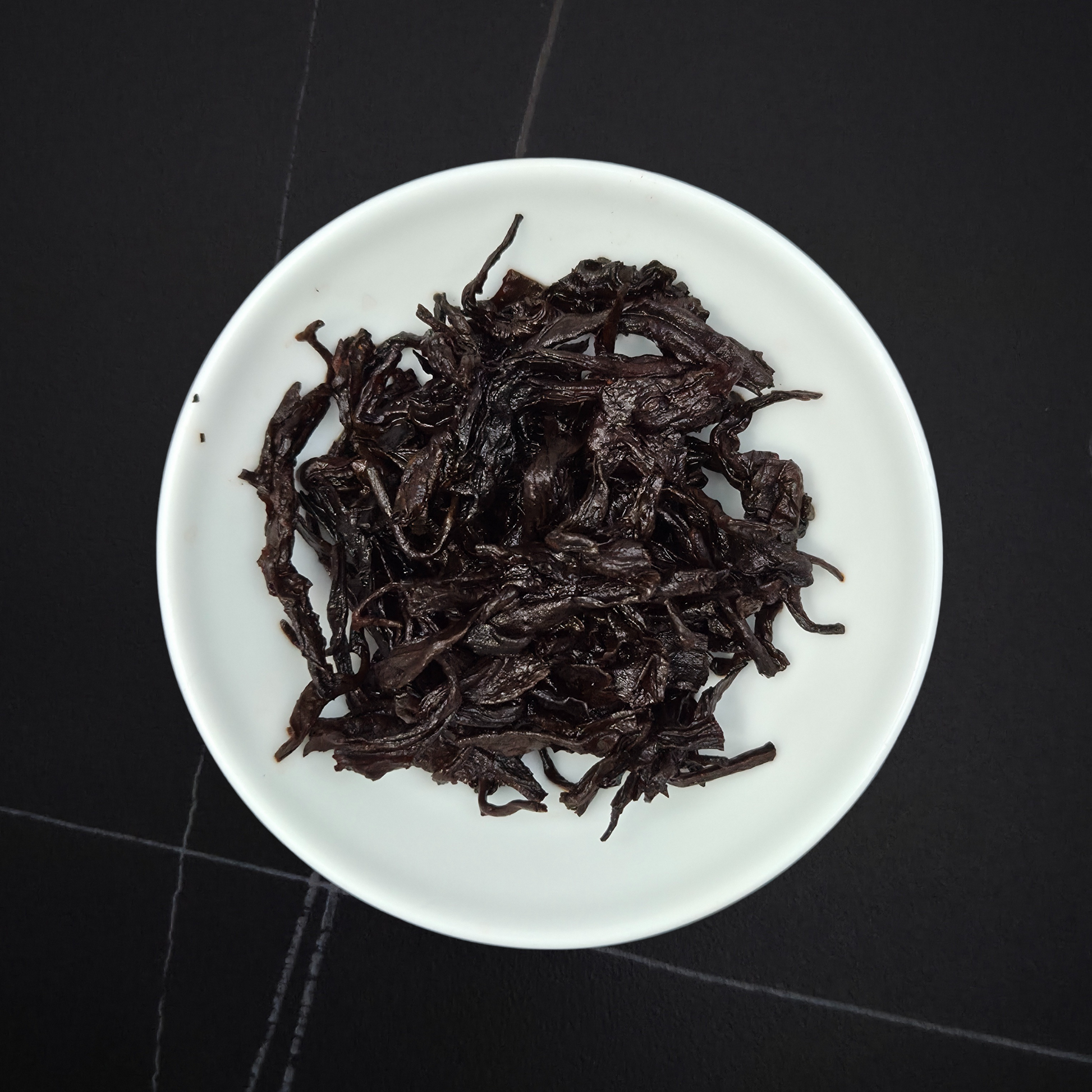 China 25 Year Aged Shu Pu'er wet leaves after brewing