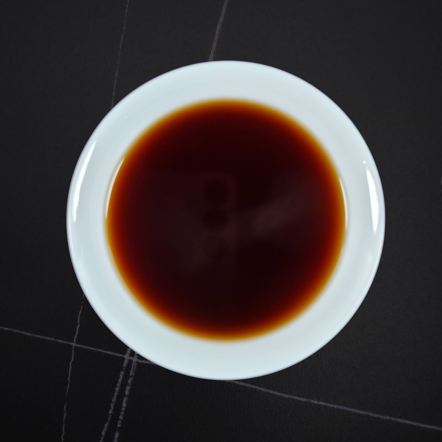 Brewed China Gong Ting 2010 shu pu’er with dark liquor