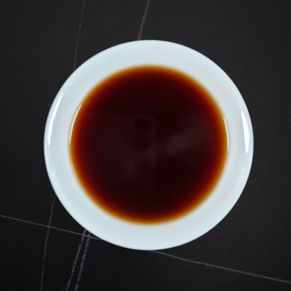 Brewed China Gong Ting 2010 shu pu’er with dark liquor