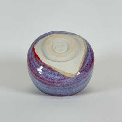Base of handmade Crimson Dawn ceramic matcha bowl showing traditional chawan foot ring