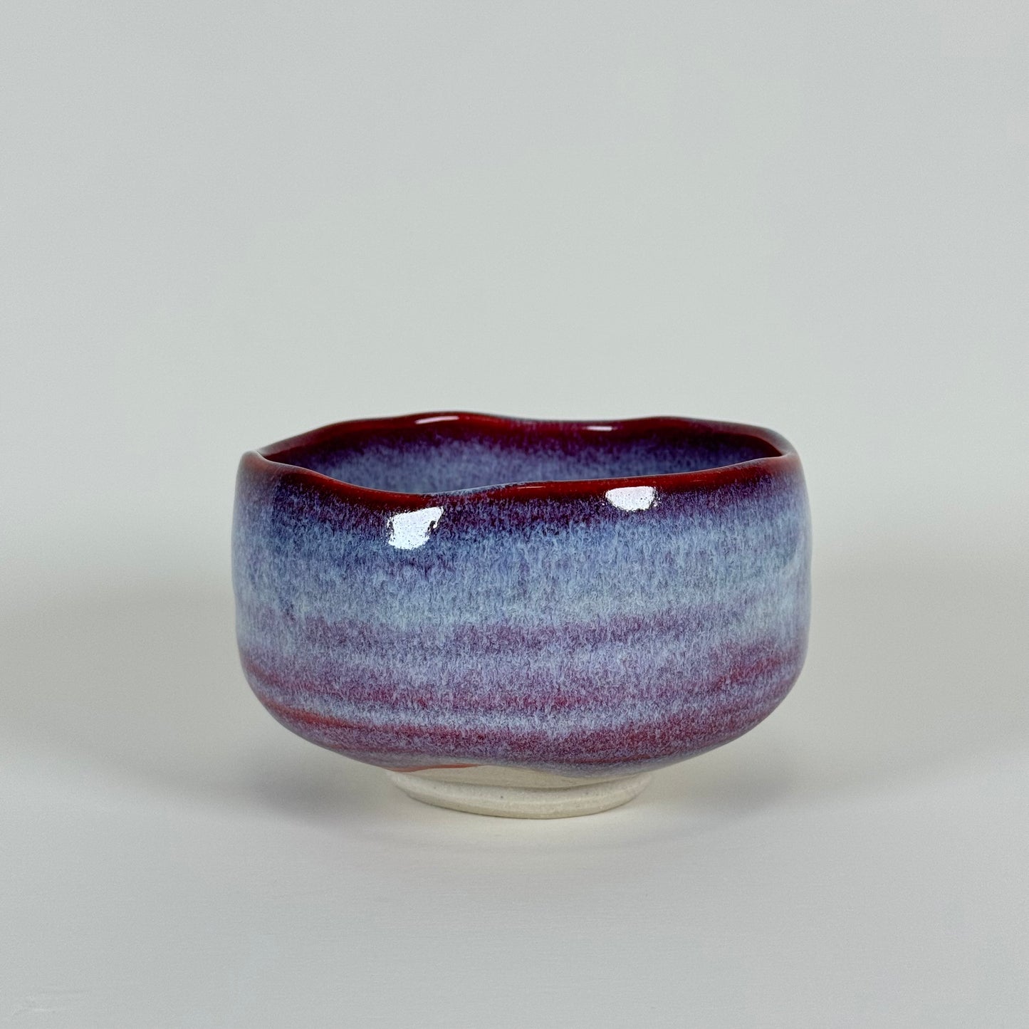 Handmade Japanese matcha bowl with crimson rim and lavender blue gradient glaze ceramic chawan