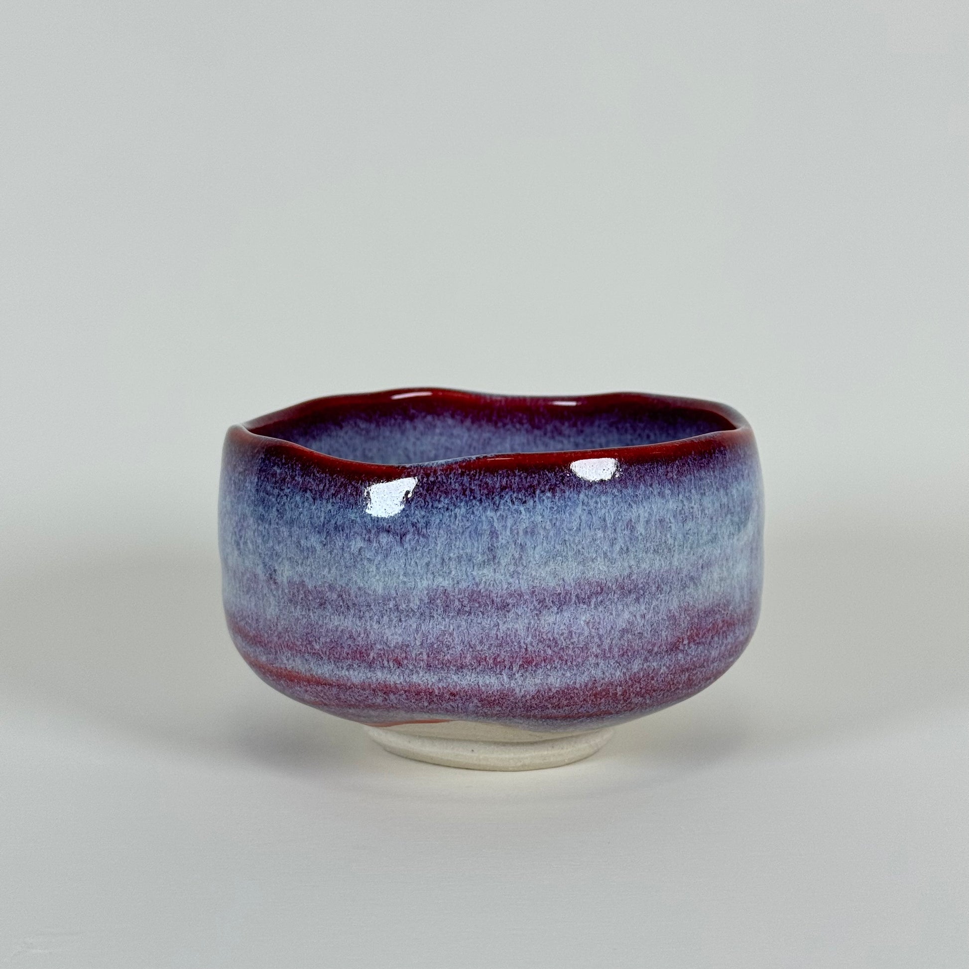 Handmade Japanese matcha bowl with crimson rim and lavender blue gradient glaze ceramic chawan