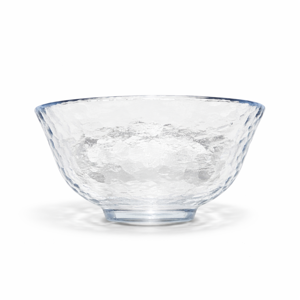 Angled view of clear Edo glass matcha bowl with textured hammered glass