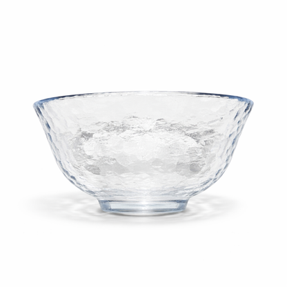 Angled view of clear Edo glass matcha bowl with textured hammered glass
