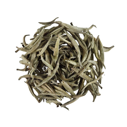 Loose Imperial Silver Needle white tea buds from Jinggu, Yunnan