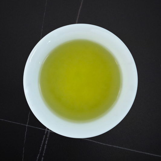 Brewed Japan Ibi Sencha green tea with bright green liquor