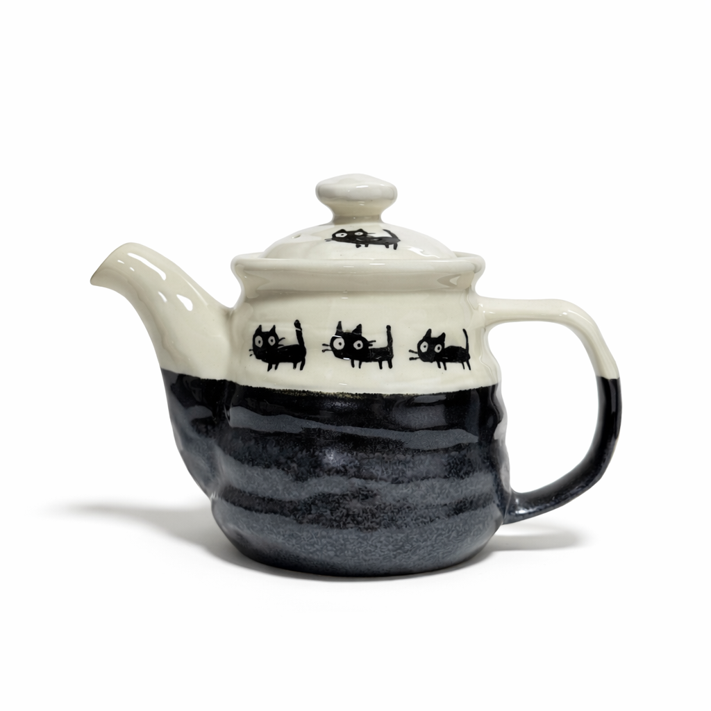 Japanese teapot with black cat motif ivory and charcoal glaze porcelain teapot with handle