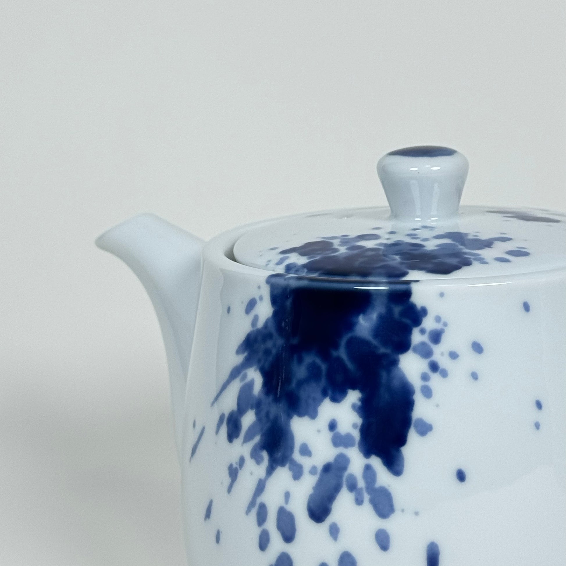 close-up of cobalt blue pattern on Mino ware porcelain teapot lid and spout miyama japan gosu