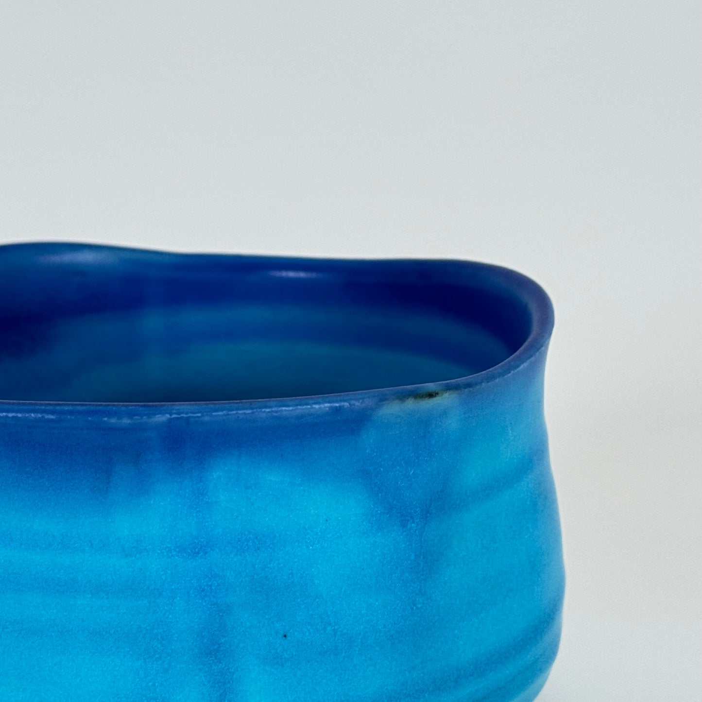 Detail of Ocean Blue Japanese matcha bowl showing turquoise to indigo gradient glaze