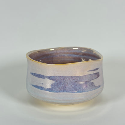 Handmade Japanese matcha bowl with pearlescent glaze in soft lavender and blue tones ceramic chawan