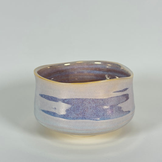 Handmade Japanese matcha bowl with pearlescent glaze in soft lavender and blue tones ceramic chawan