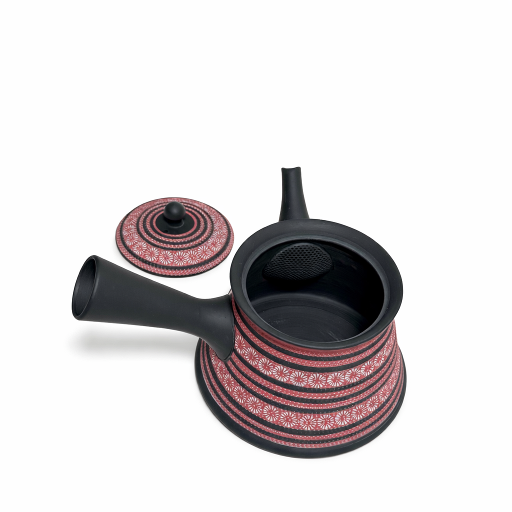 Top view of Japanese kyusu teapot showing lid and interior with built-in tea strainer