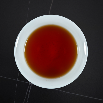 Brewed Taiwan Sun Moon Lake black tea with deep amber liquor