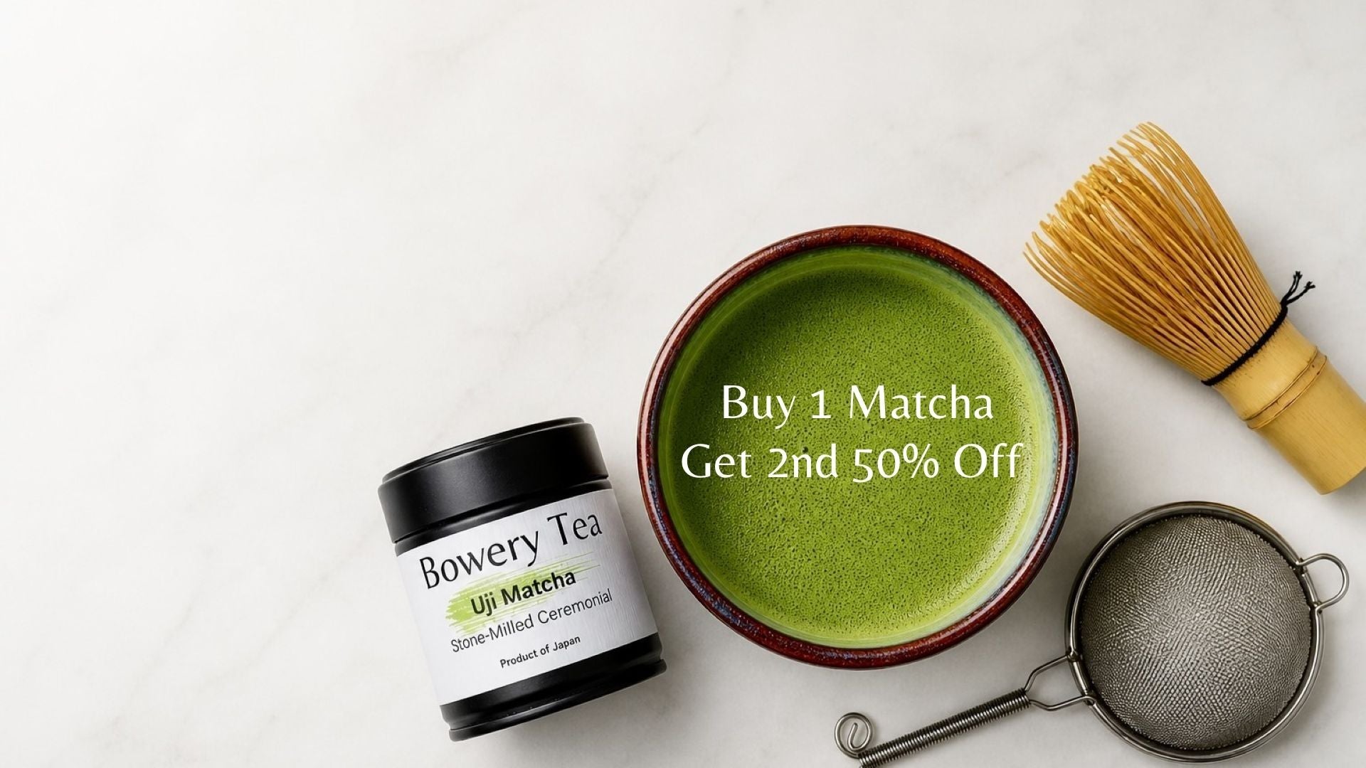 matcha tea bowl with whisk and uji ceremonial matcha on white background